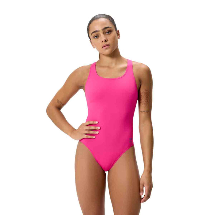 Speedo women's FL Solid Powerback swimsuit in Punchy Pink, featuring a sleek design and comfortable fit for active swimming.
