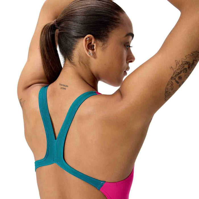 Speedo Women's FL Solid Powerback Swimsuit in Punchy Pink, featuring a sleek design and supportive fit for swimming.