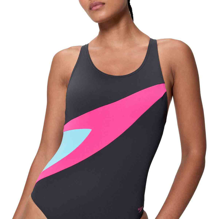 Speedo women's HyperBoom butterfly back swimsuit in anthracite and margarita pink, shown on a model.