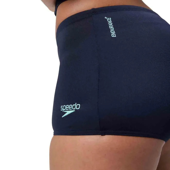 Speedo Women's HyperBoom Splice Tankini in Lagoon Blue, featuring a stylish swim top with colorful splice design and adjustable straps.
