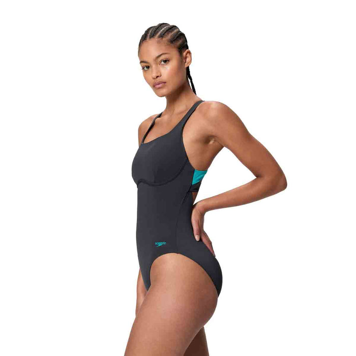 Speedo women's solid flex band swimsuit in anthracite and Mayan blue, featuring a sleek, supportive design for swimming and pool activities.