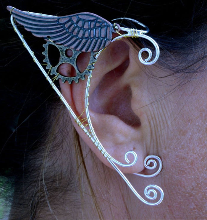 Model wearing steampunk silver wing elf ear wrap, no piercing