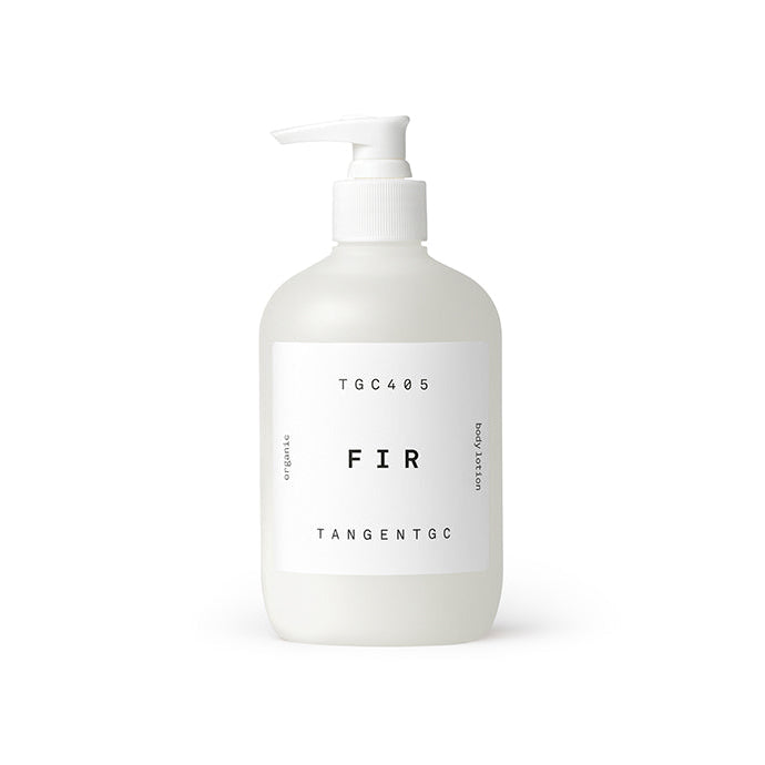 A white pump bottle labeled 'Tangent GC Fir' for body lotion.