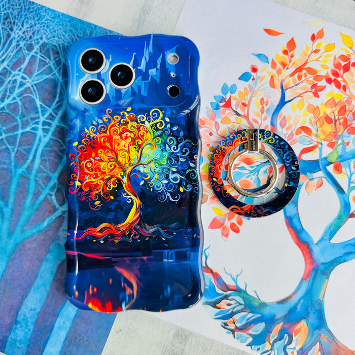 The Wishing Tree mystical fantasy MagSafe phone grip ring with vibrant orange and blue swirling filigree branches on a dark background compatible with iPhone and Samsung