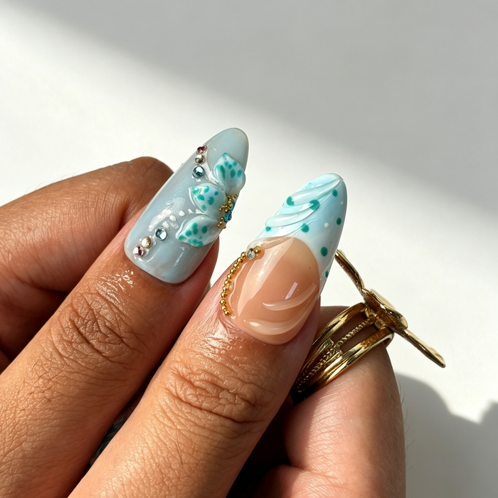 Close‑up ocean themed press‑on nails, seashell charm fake nails