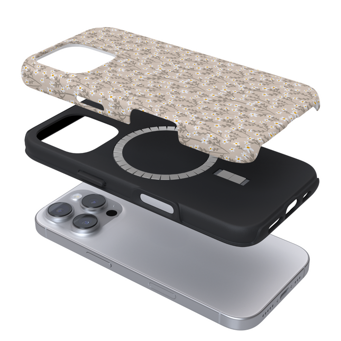 Tough MagSafe® phone case with nude floral pattern, black border, and sleek silver accents.