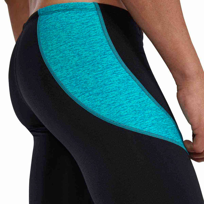 TYR men's teal lapped curve splice jammer swimwear, close-up view of the snug-fitting swim jammers with spliced design