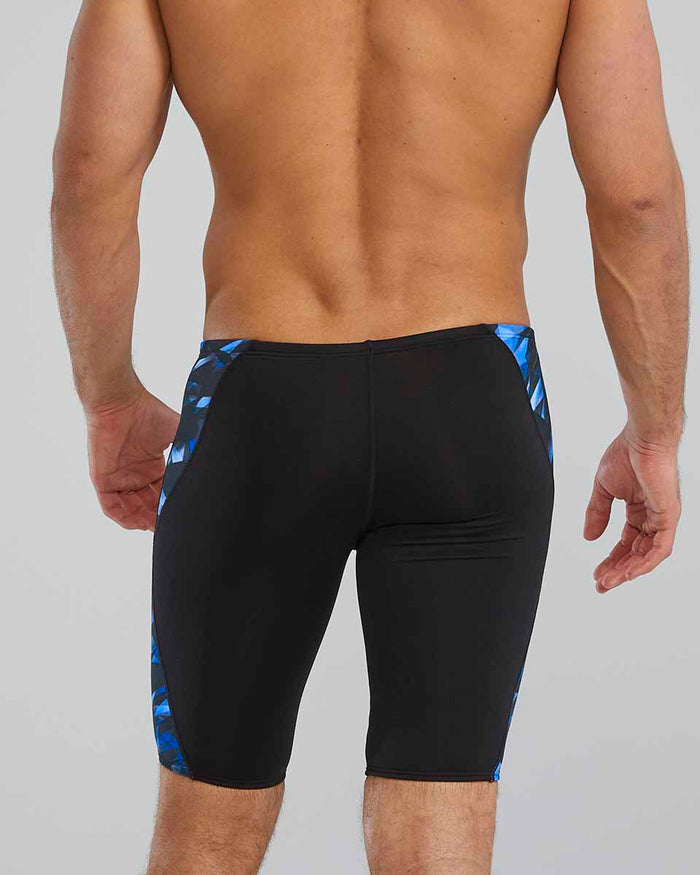 Blue TYR men's Triadic Blade Splice jammer, close-up view showing the sleek design and fabric texture for competitive swimming.