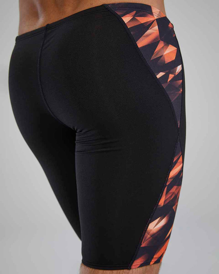 TYR men's Triadic Blade Splice jammer in bright orange with sleek, ergonomic design for competitive swimming.