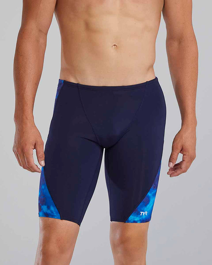 Blue TYR men's Waveform Blade Splice jammer showing a fitted swimwear design with the TYR logo and sporty pattern.