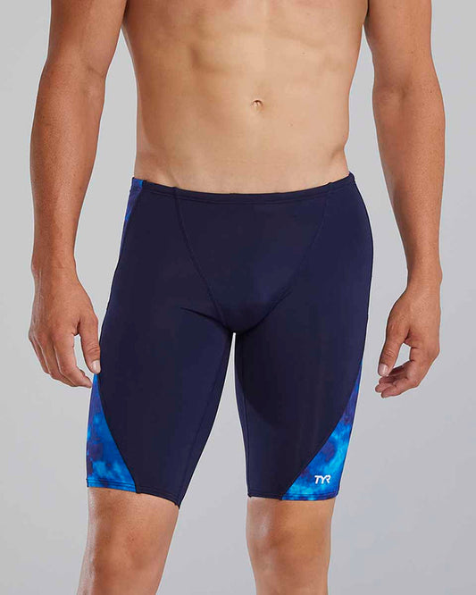 Blue TYR men's Waveform Blade Splice jammer showing a fitted swimwear design with the TYR logo and sporty pattern.