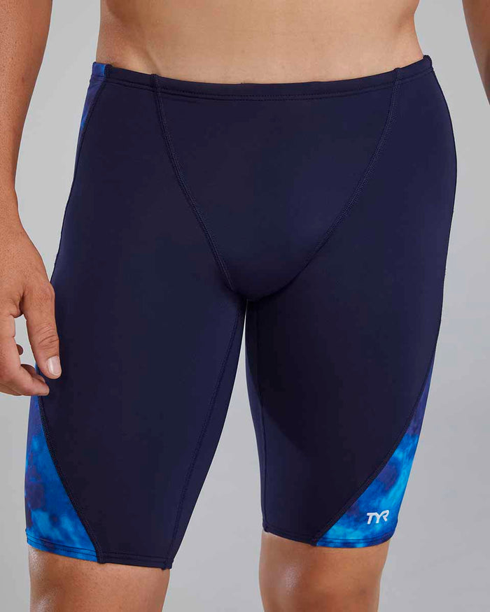 TYR Men's Waveform Blade Splice Jammers in blue, close-up view showing the swimwear fabric and design details.