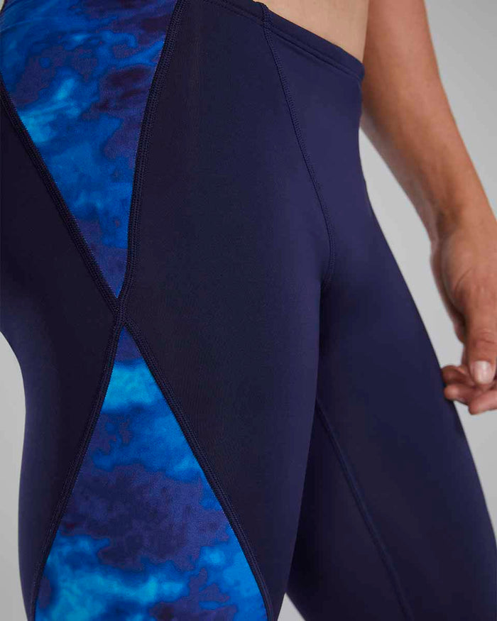 TYR men's Waveform Blade Splice jammer in blue, designed for competitive swimming, featuring a sleek, streamlined fit.