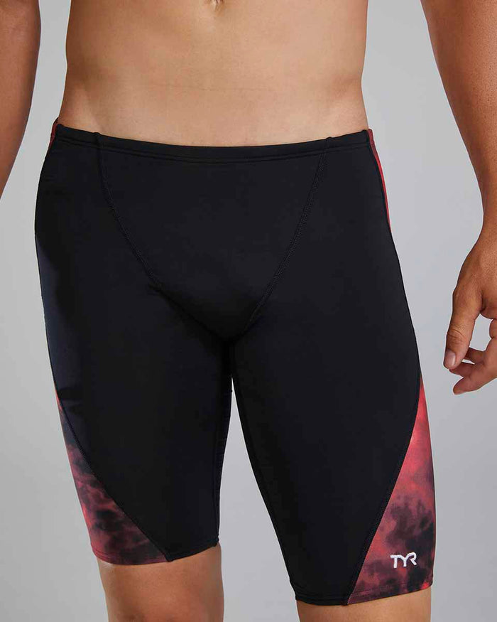 TYR men's Waveform Blade Splice jammer in red, close-up view showcasing the sleek swimwear design and branding details.