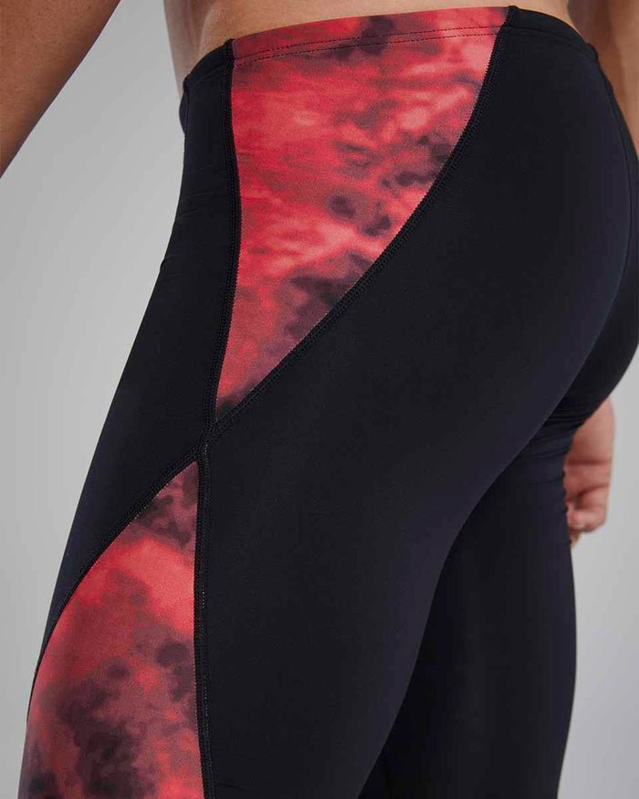 Red TYR men's Waveform Blade Splice jammer swimwear with sleek design and secure fit for competitive swimming.