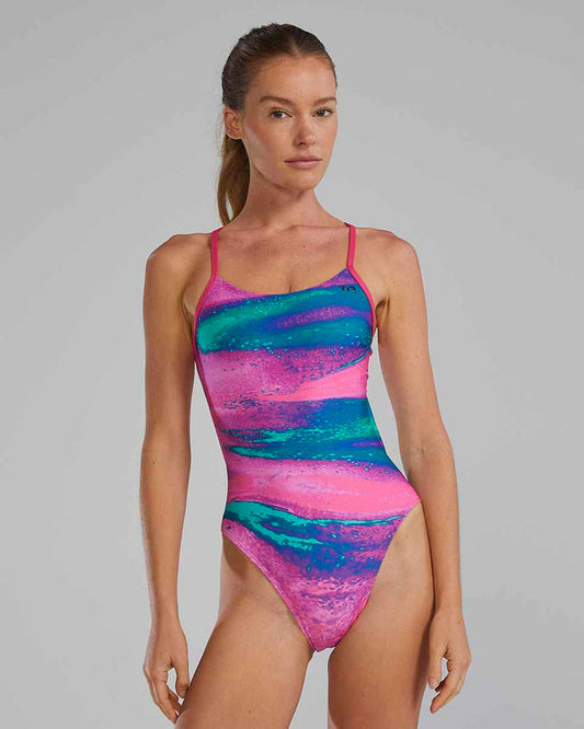 TYR Women's Diffusion Cutoutfit swimsuit in plasma color, featuring sleek design and cutout details, perfect for swimming and beachwear.