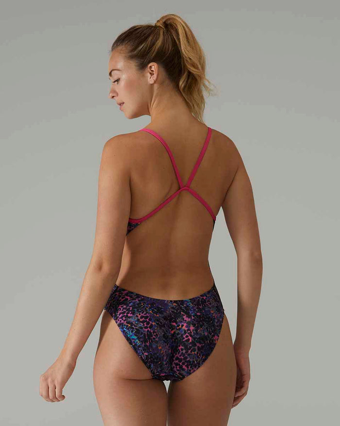 TYR women's stipple cutout swimsuit in petunia color, featuring a stylish design with cutout details for active swimming or beachwear.