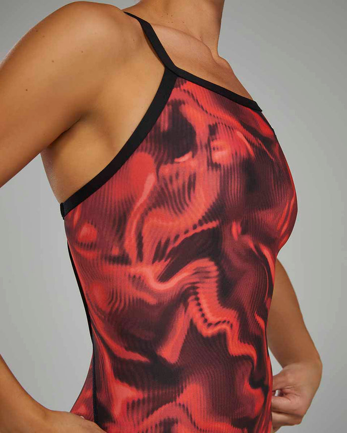 Red TYR Women's Waveform Diamondfit swimsuit, close-up of the swimsuit's sleek fabric and stylish design.