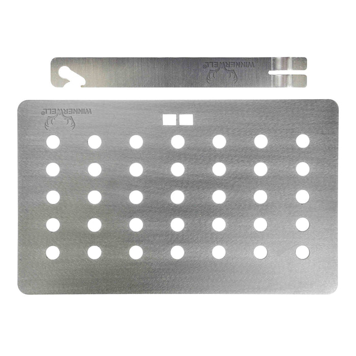 Top - down view of Winnerwell® stainless steel grill plate, highlighting the uniform arrangement of circular holes and the overall metallic, durable construction.