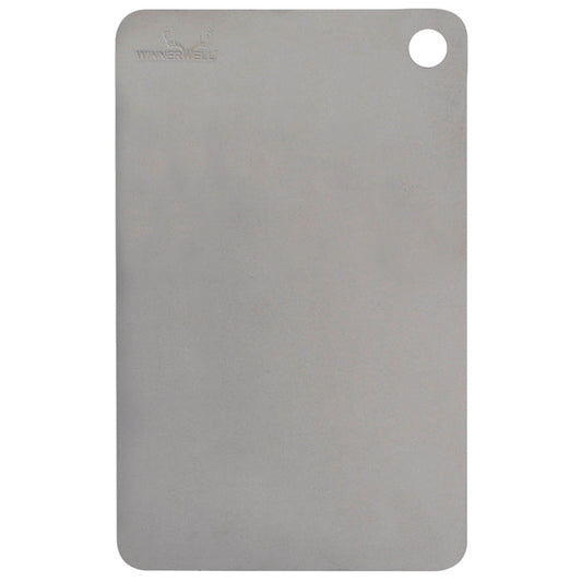 Winnerwell® titanium cutting board with a hanging hole, showcasing its sleek, flat, rectangular shape and metallic finish.